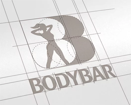 Дизайн логотипа для BODYBAR от Soldis, представляющий собой стилизованный силуэт позирующей женщины, интегрированный в формы двух перекрывающихся кругов, образующих букву B, на фоне линий строительной сетки.