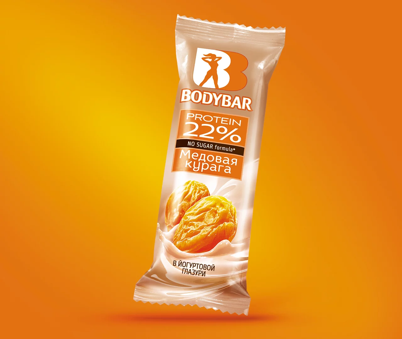 Протеиновый батончик BodyBar в бежевой упаковке с изображением кураги, надписями «Протеин 22%» и «Формула без сахара» на русском языке от Soldis, на оранжевом фоне.