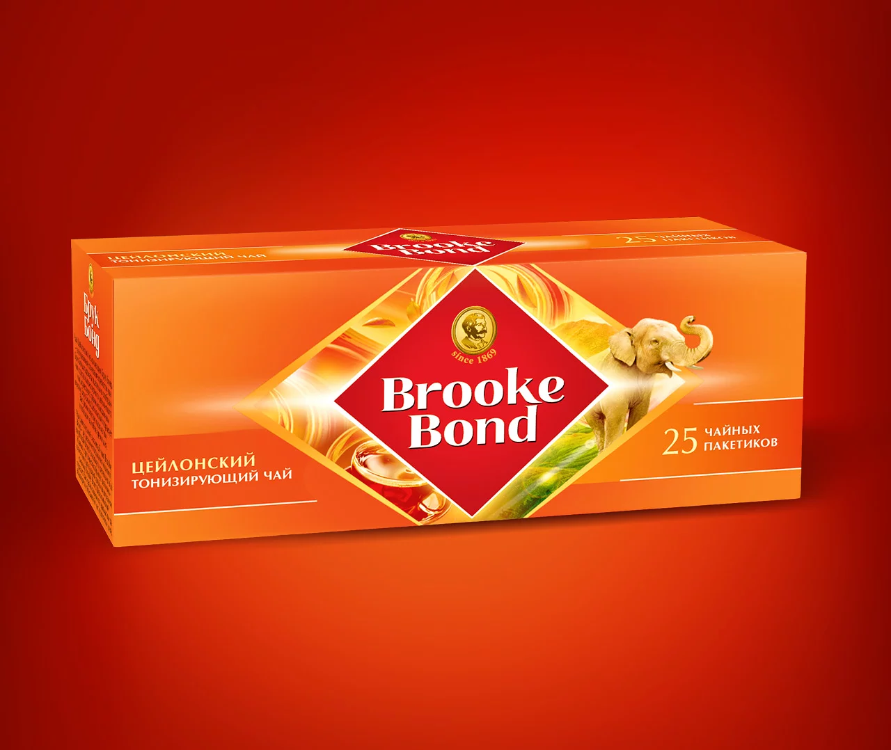 Прямоугольная оранжевая коробка чая Brooke Bond Ceylon с логотипом в виде красного ромба, изображением слона, кириллическим текстом, указывающим на 25 чайных пакетиков, и брендингом Soldis на красном фоне.