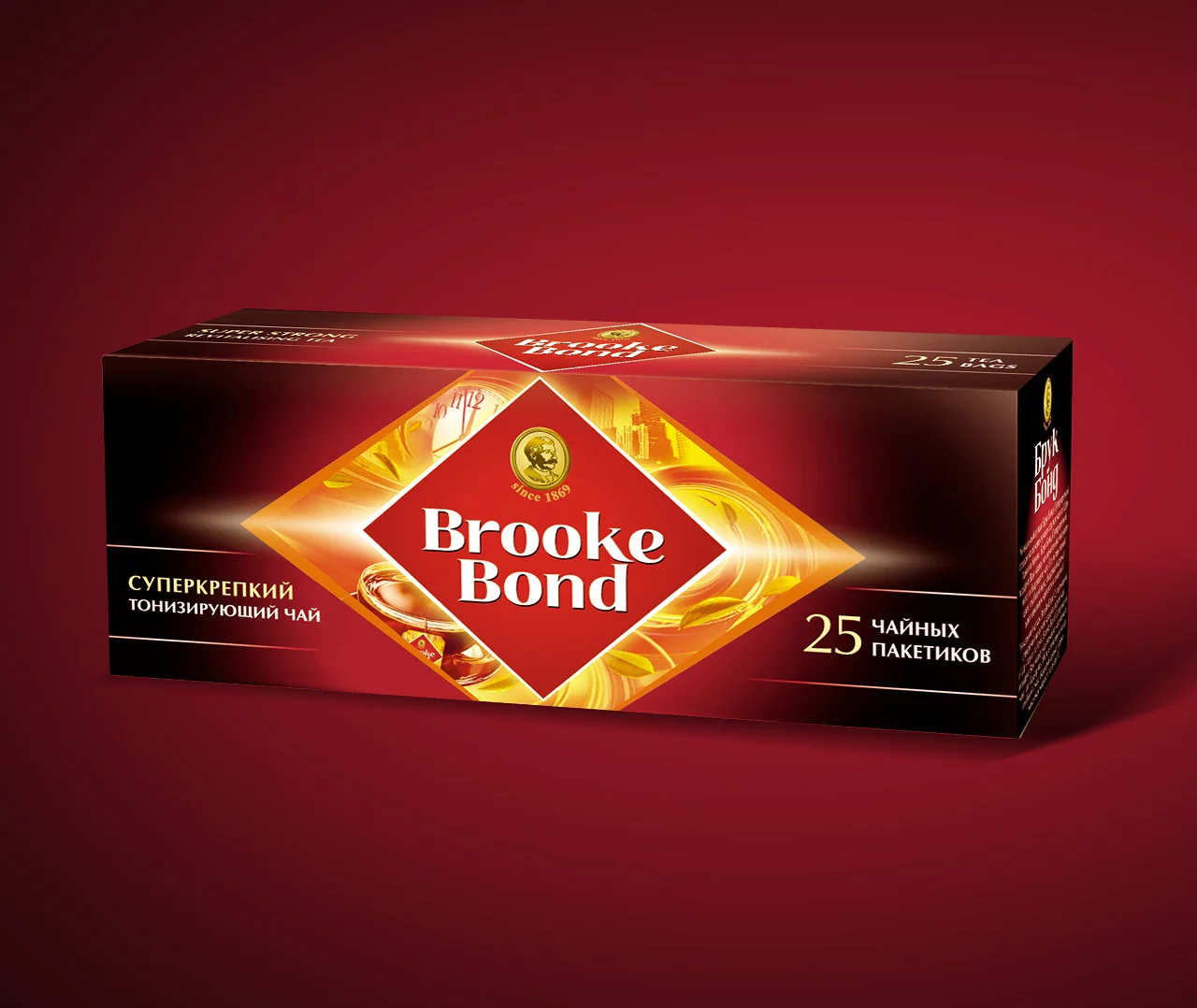 Коробка чая Brooke Bond с красно-золотым дизайном, на которой изображен логотип Brooke Bond в форме ромба. Коробка, представленная Soldis, содержит 25 чайных пакетиков с русским текстом. Фон — градиентный красный.